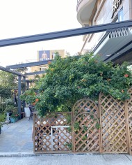 Pergola Tissa avec toit en toile en position ouverte