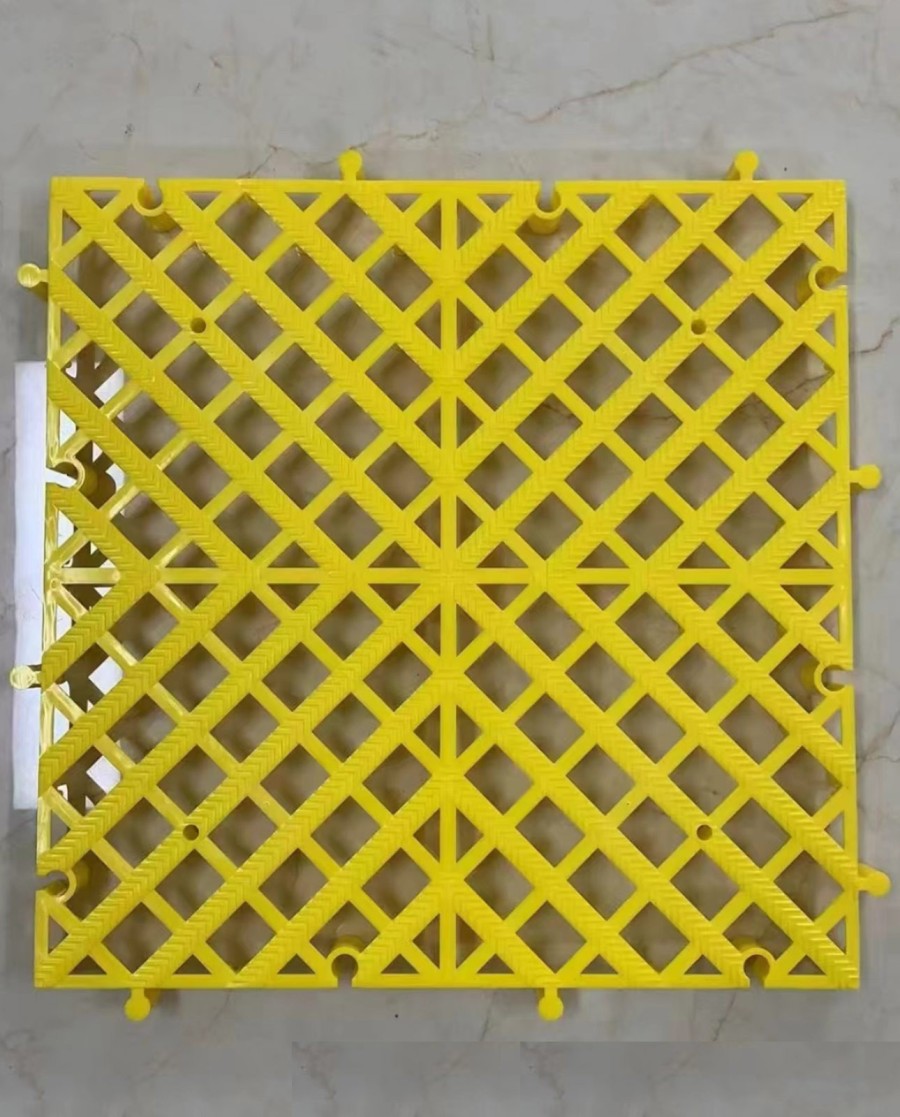 Dalle carrée dimensions : 40 cm x 40 cm épaisseur 2 cm en polypropylène ultra résistant